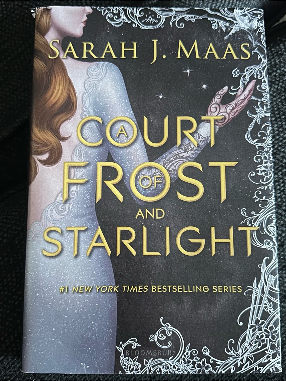 A Court of Frost and Starlight - Sarah J. Maas 1/1